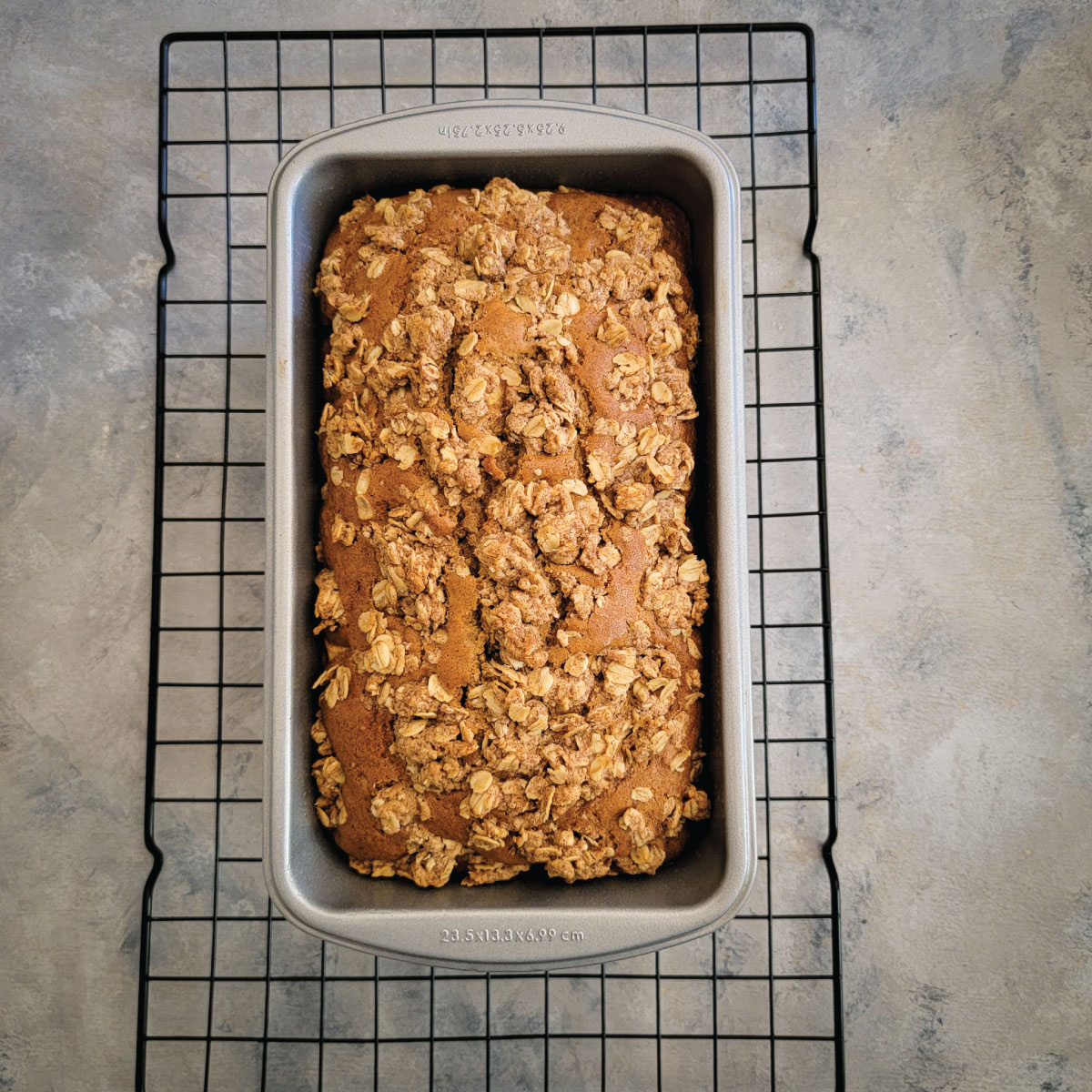 apple bread sliced and placed on a plate to serve