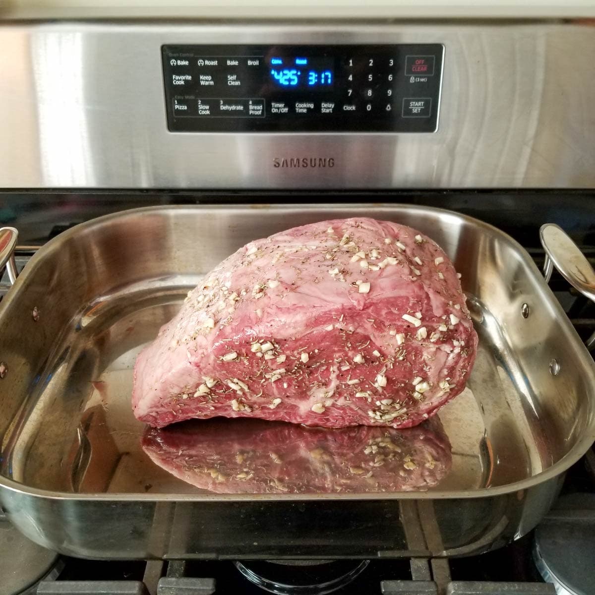 Roast in a roasting pan seasoned and ready to go into the oven.