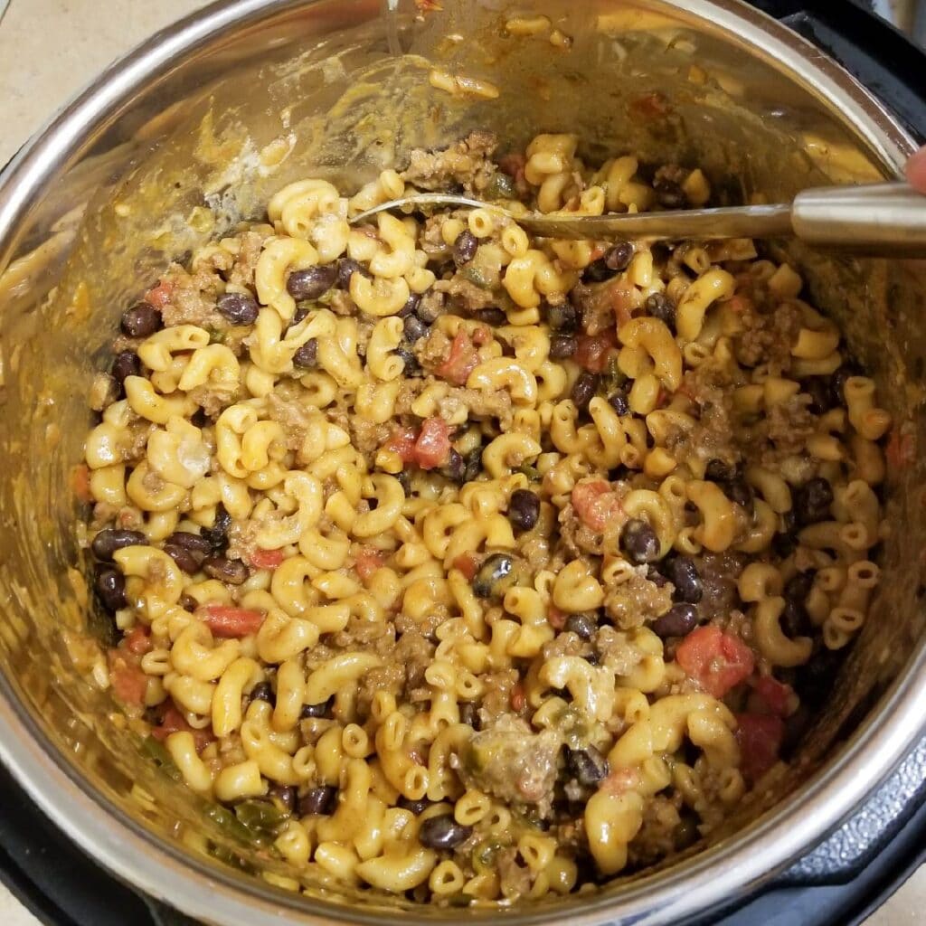 Adding in the beans, sour cream and cheese after the pressure cooking