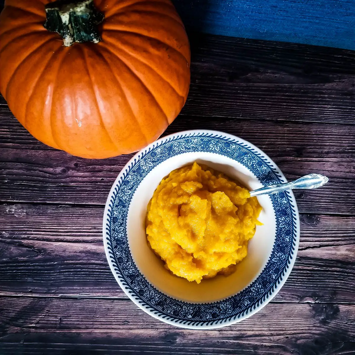 Pumpkin puree in a bowl after cooking and ready to use.