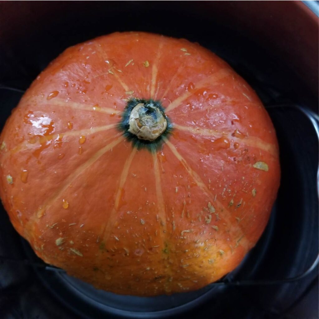 Red kuri squash washed and in the Instant Pot ready to cook