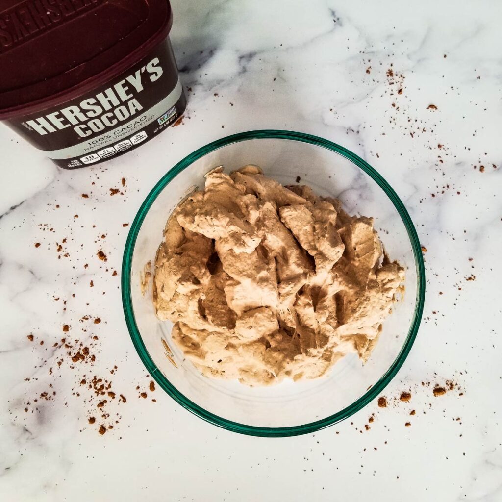 Chocolate whipped cream in a bowl ready to be brought to the table for dessert.