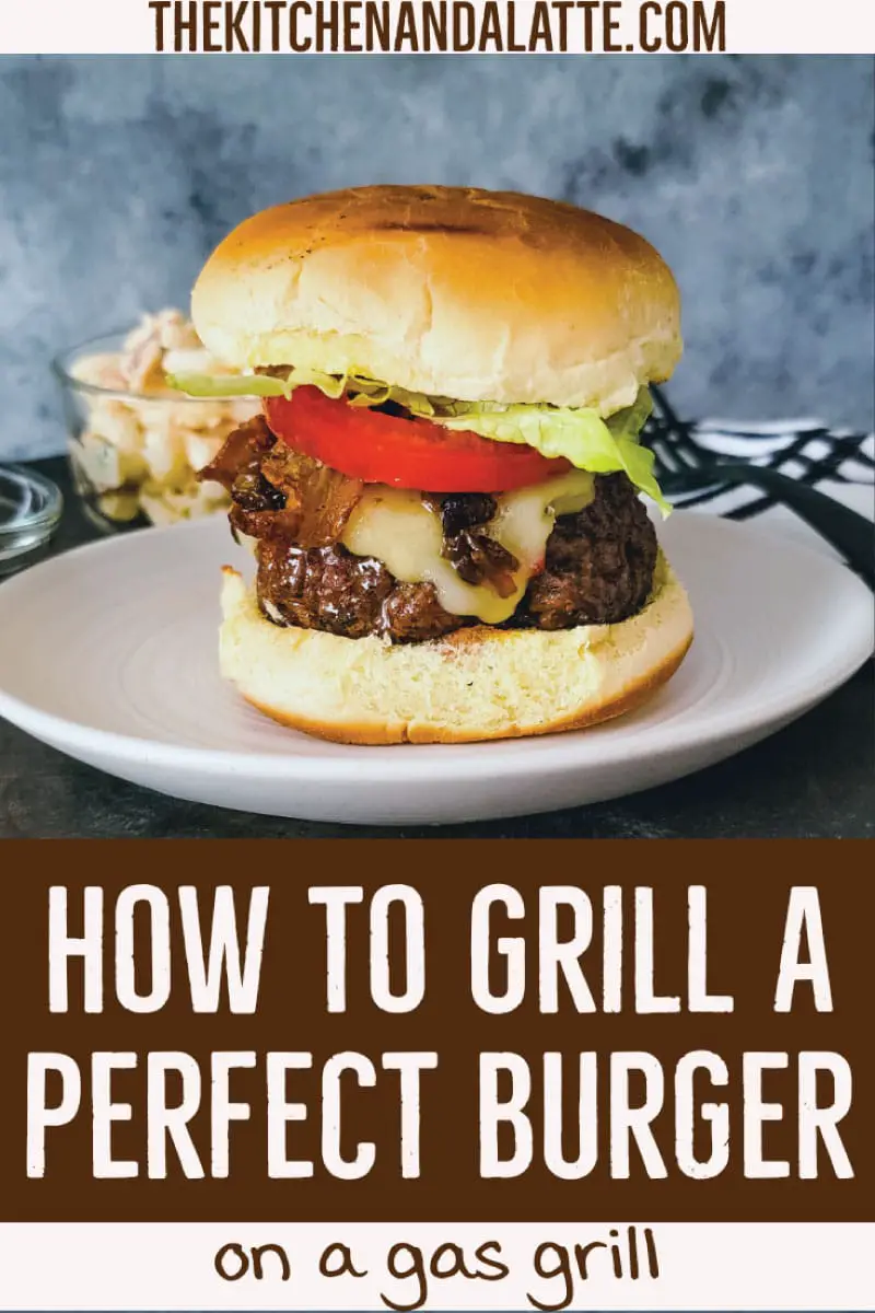 How to grill a perfect burger on a gas grill - Pinterest image. Cheeseburger on a roll topped with onion, lettuce and tomato.
