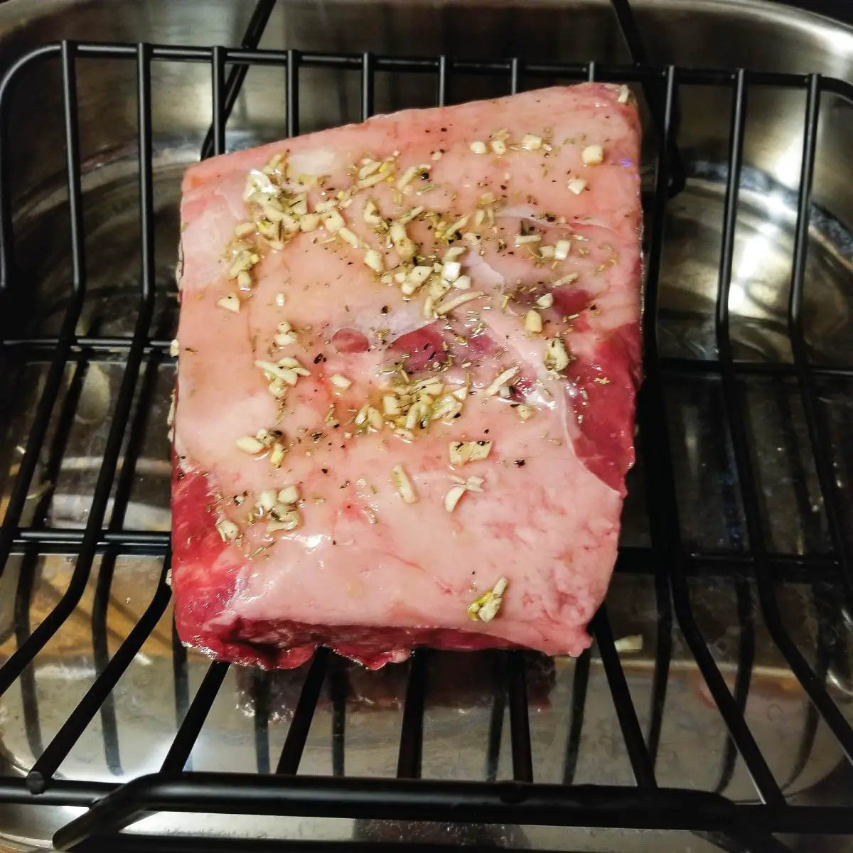 Roast on a rack in the roasting pan covered in the seasoning mix ready to go in the oven.