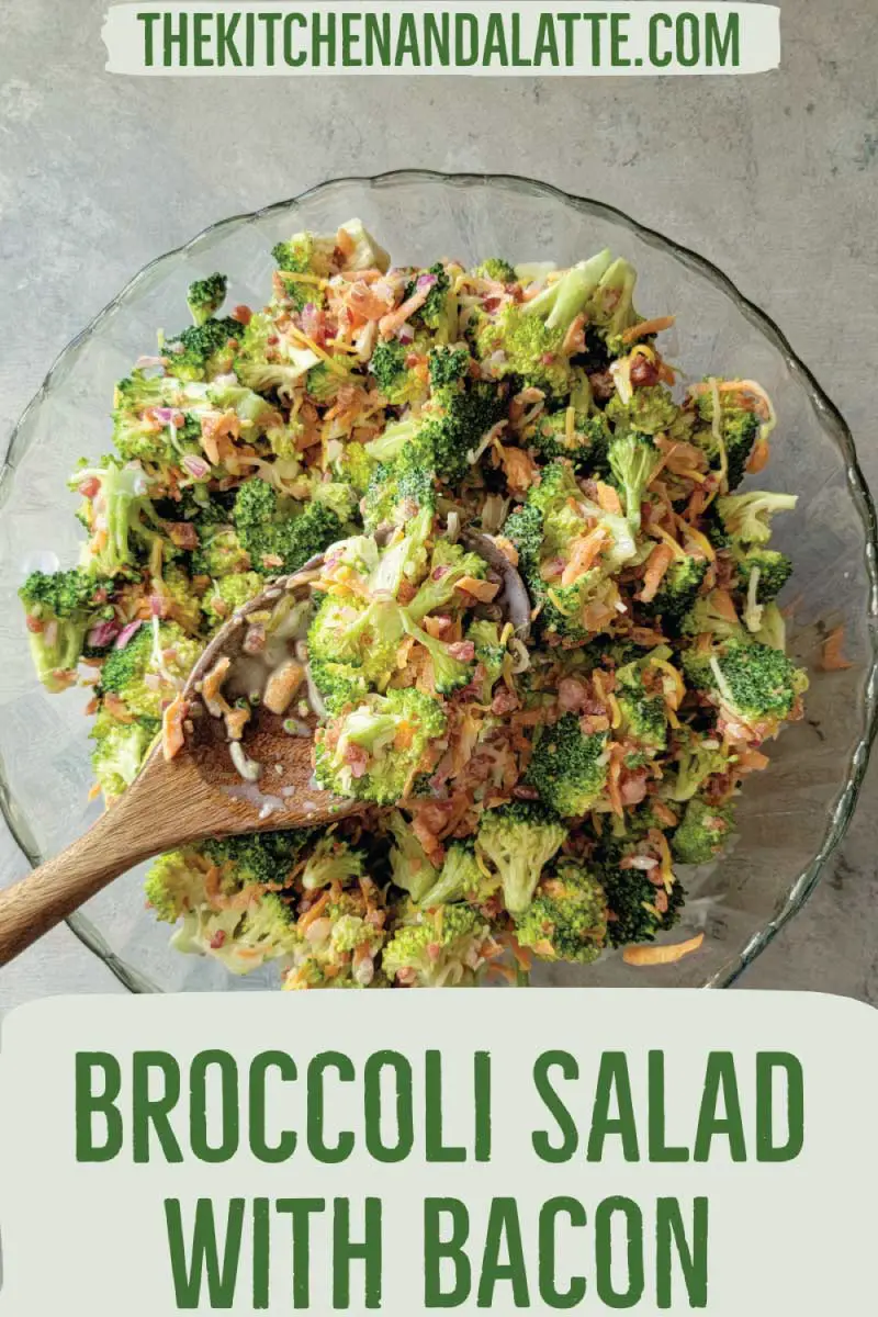 Broccoli salad with bacon Pinterest image. Broccoli salad in a serving bowl being scooped out with a spoon to serve.