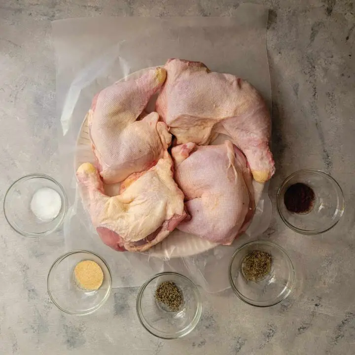 Ingredients prepped for grilling the leg quarters.