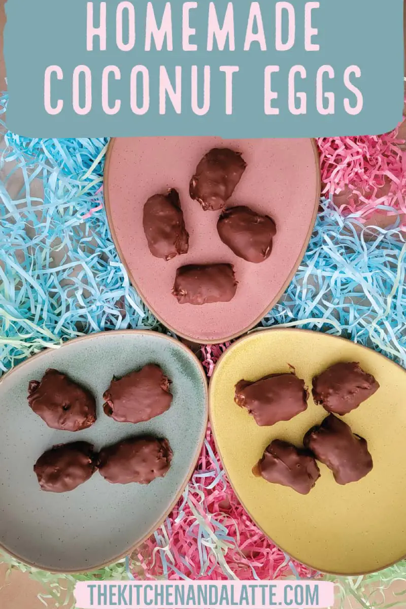 Homemade coconut eggs Pinterest graphic. Chocolate covered eggs on a pastel plates with Easter grass around the plates as decoration.
