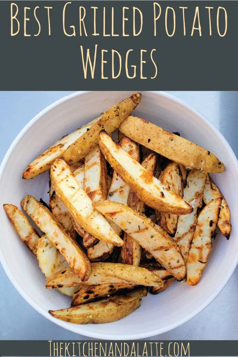 Best grilled potato wedges Pinterest graphic. Potato wedges in a serving bowl after being grill ready to serve.