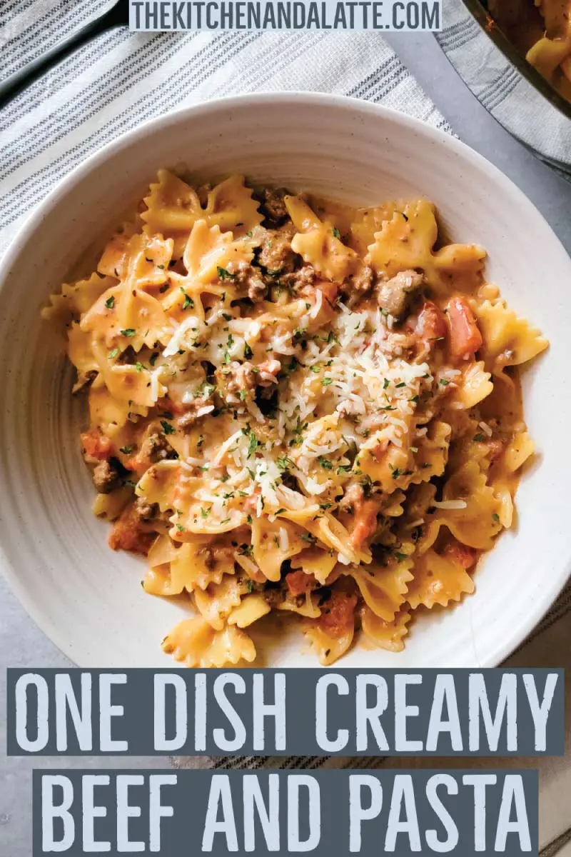 One dish creamy beef and pasta Pinterest graphic. Beef pasta in a dish topped with shredded cheese and parsley as a garnish.