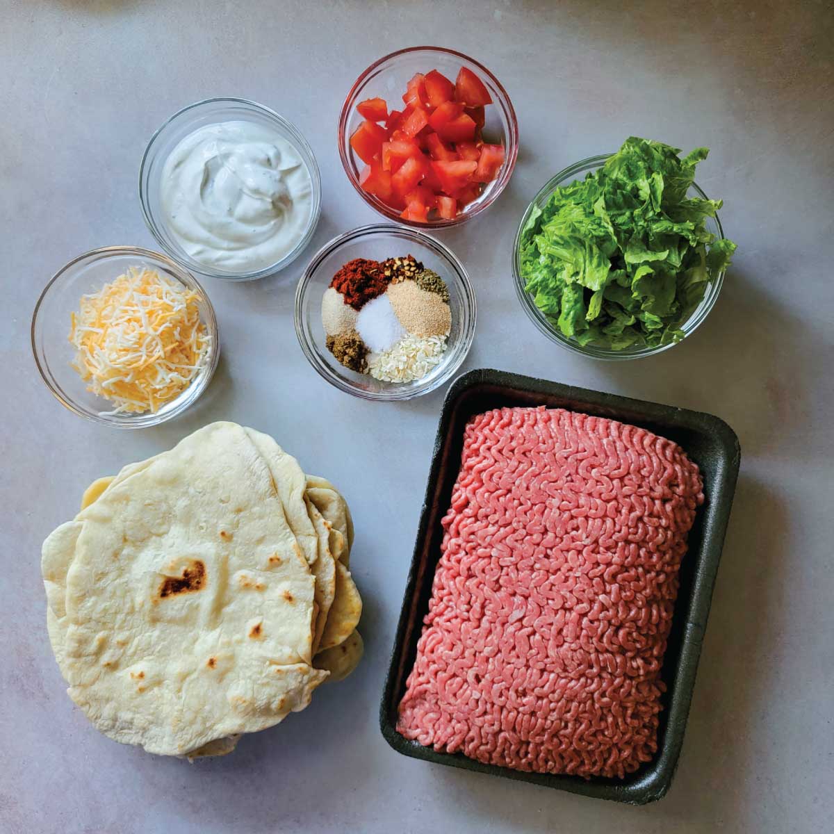 Ingredients prepped for tacos including some common toppings.