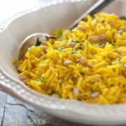 Golden rice pilaf in a serving bowl ready to eat.