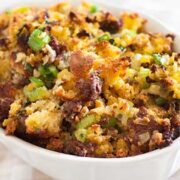 cornbread stuffing with sausage in a serving dish ready to serve.